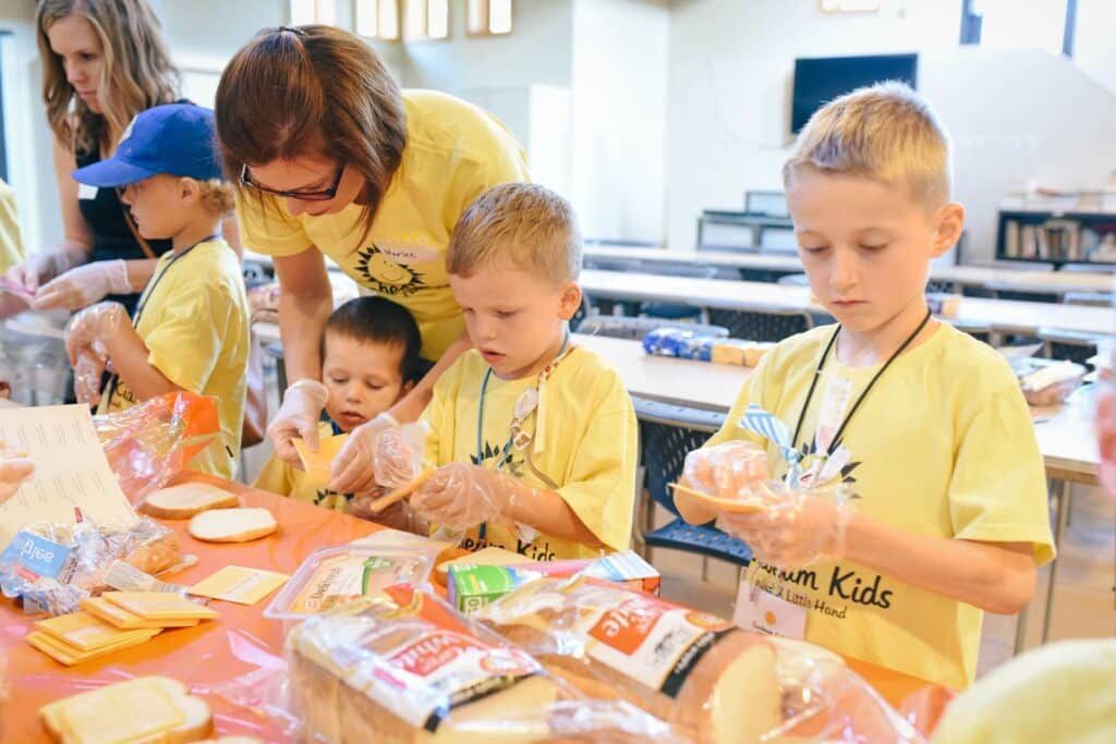 Teacher working with students
