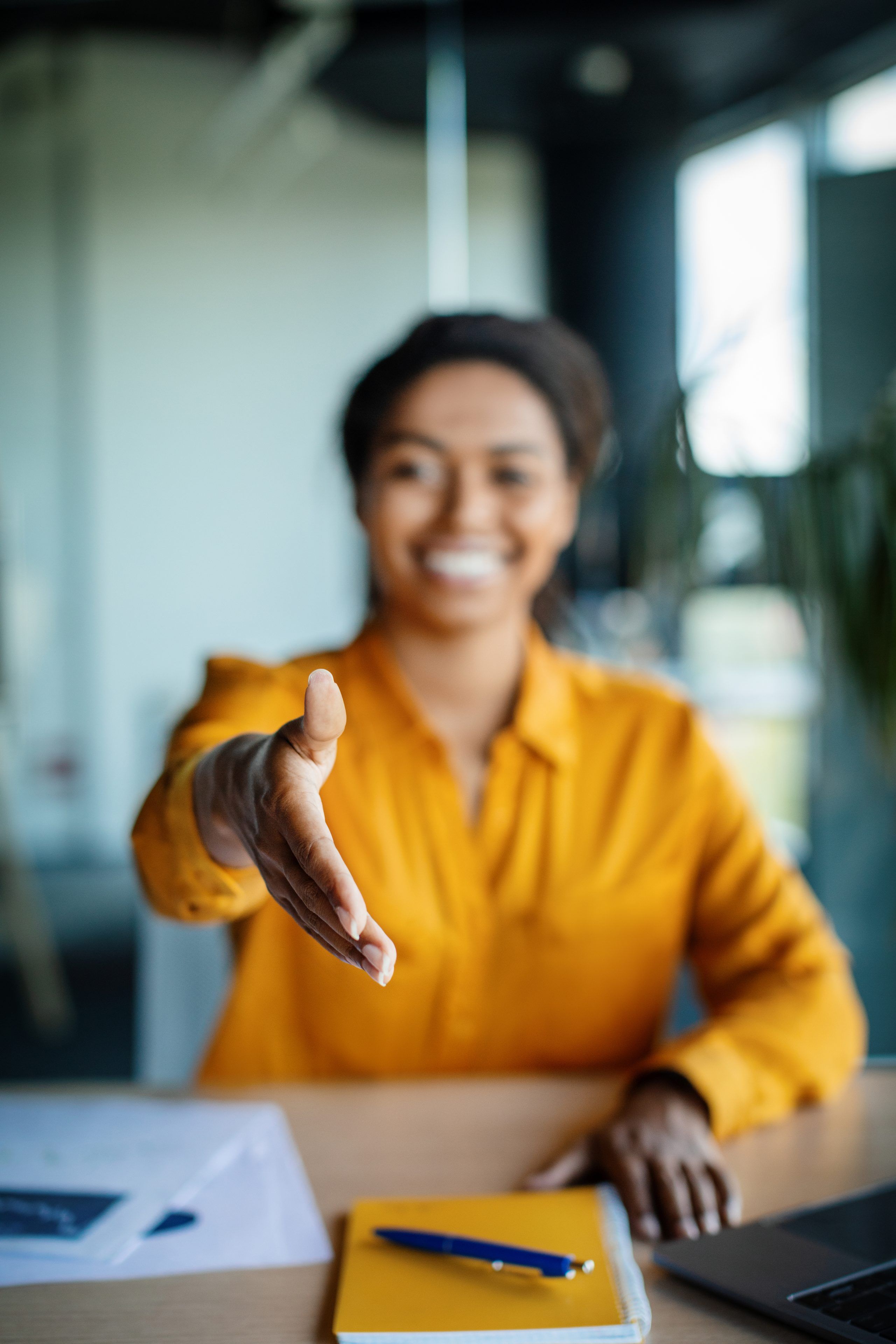 Business women about to shake someones hand